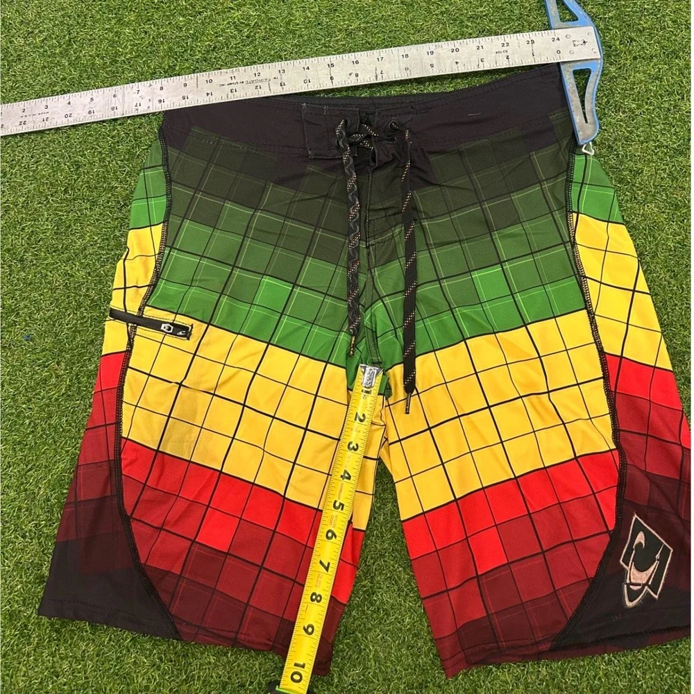 ONeill Hyperfreak Men Board Short Size 31 Rasta Green Yellow Red Grid Swim Trunk